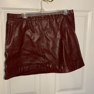 red faux leather skirt
